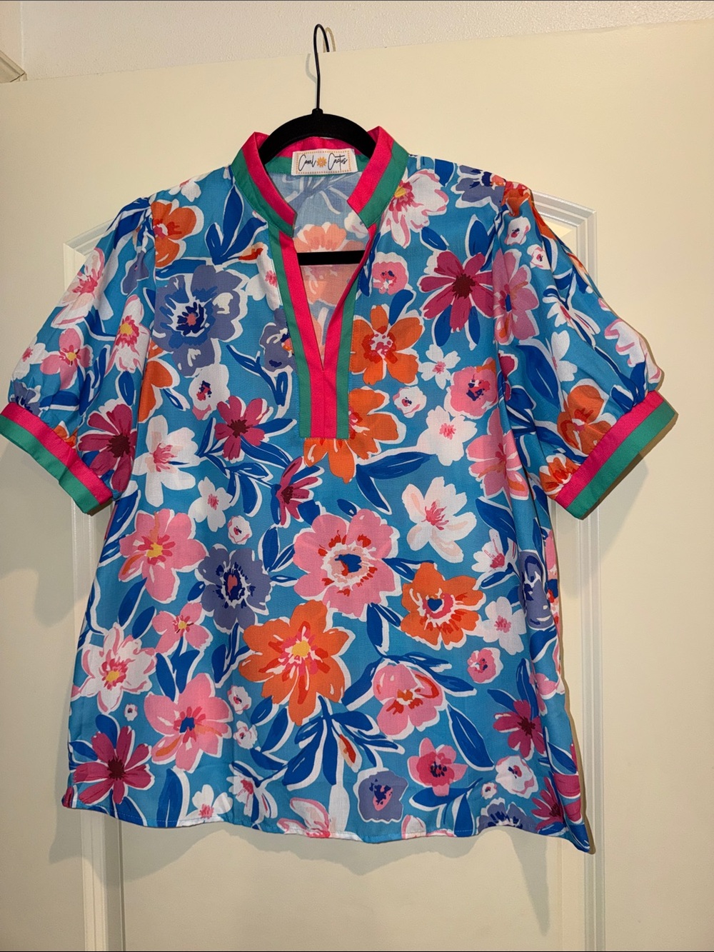 Vibrant Blue Floral V-Neck Blouse with Pink & Orange Accents